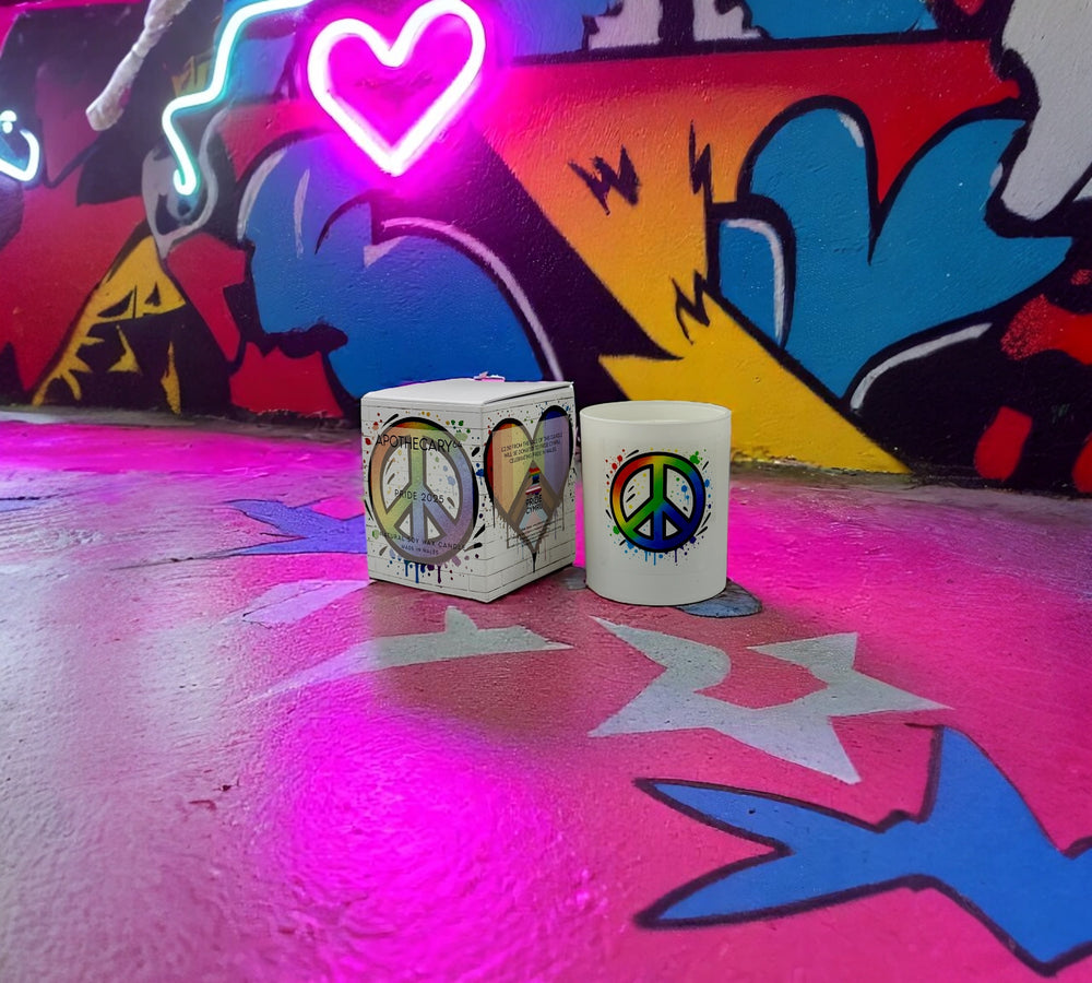 "Limited edition Pride Cymru candle with rainbow label"


